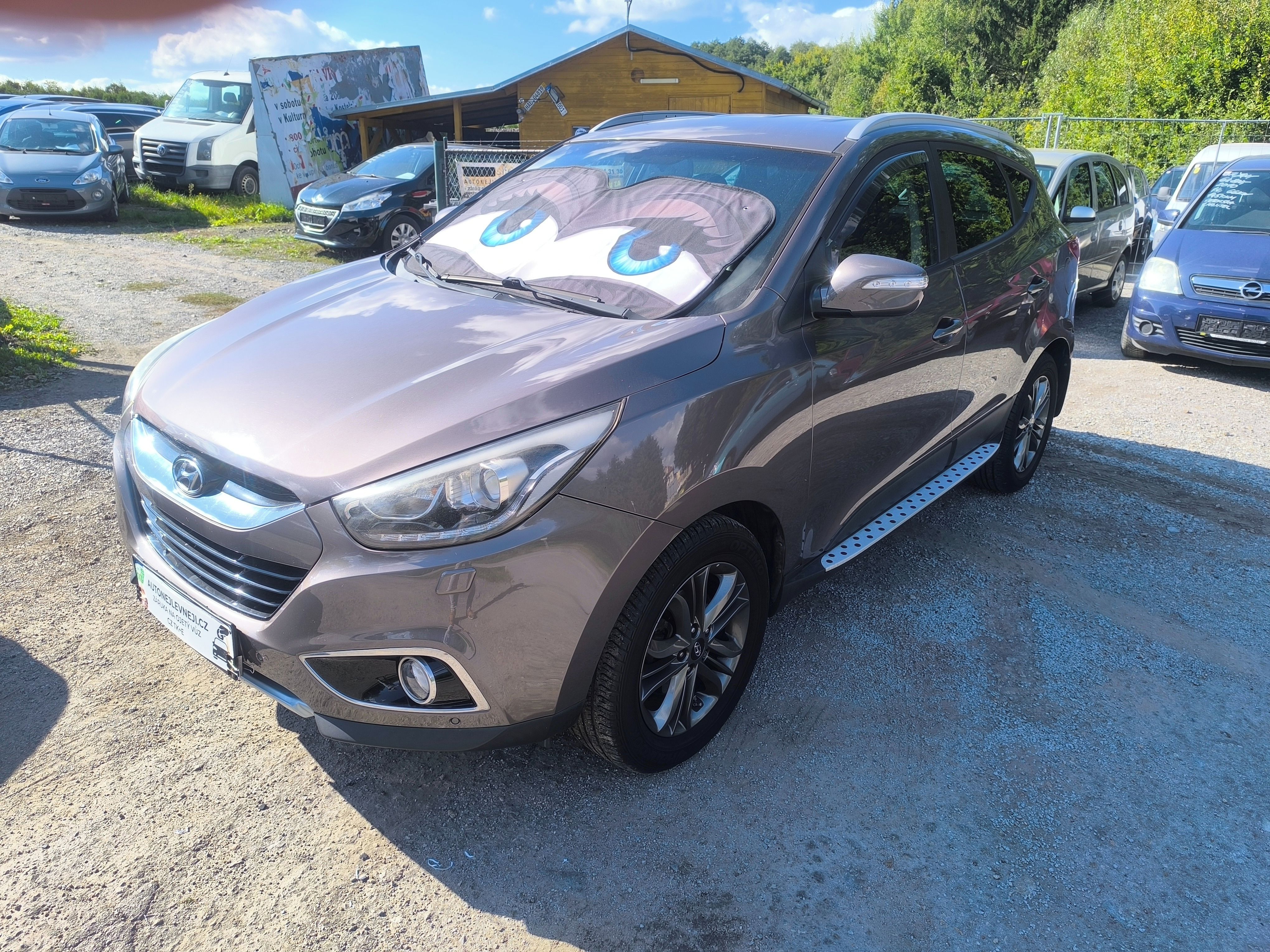 Hyundai ix35, 2.0D4X4,90KM,MAX VÝBAVA,KRÁSNÝ - fotka 3
