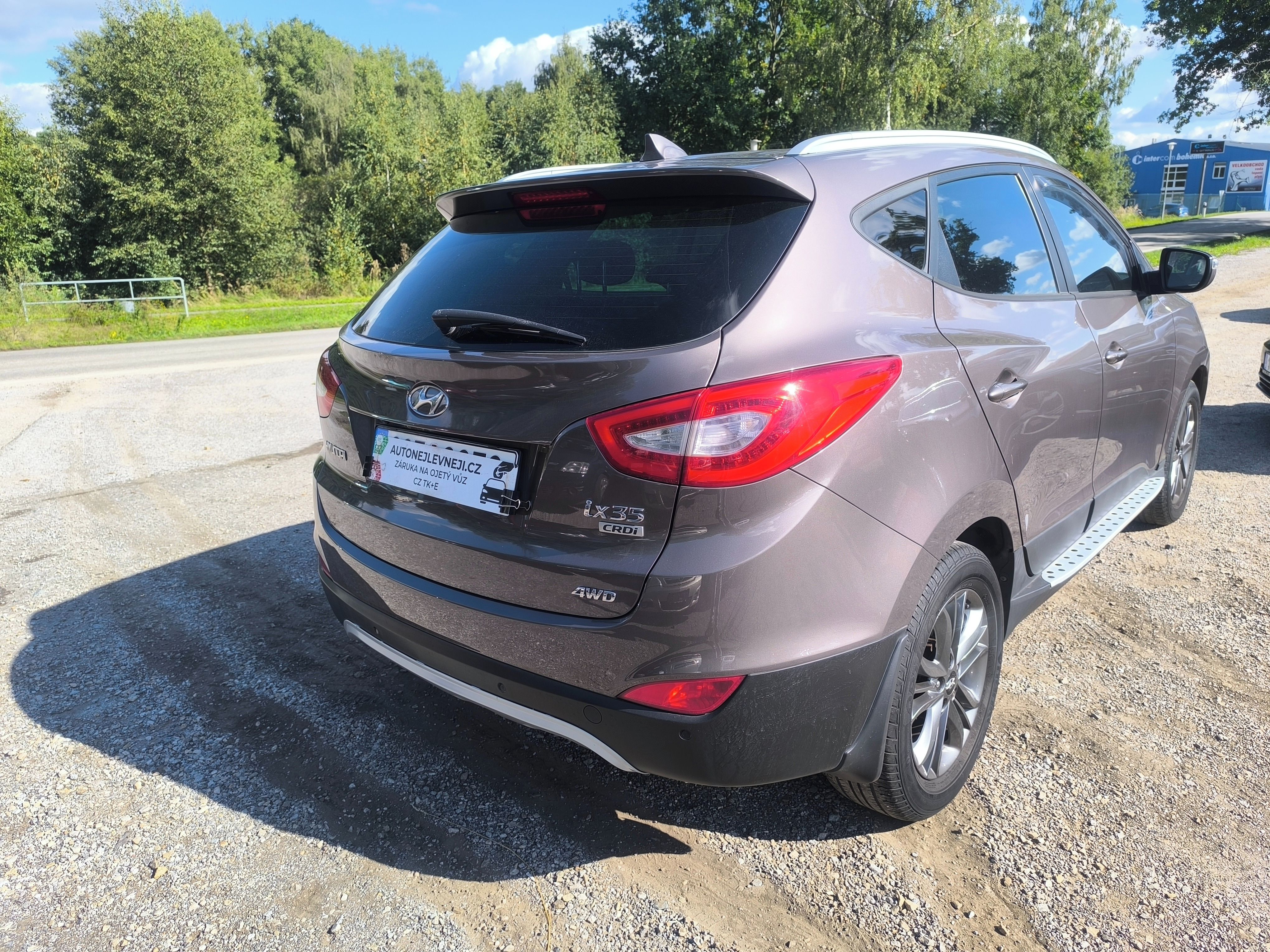 Hyundai ix35, 2.0D4X4,90KM,MAX VÝBAVA,KRÁSNÝ - fotka 4
