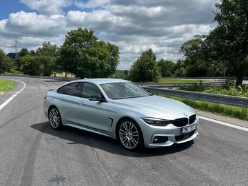 430i