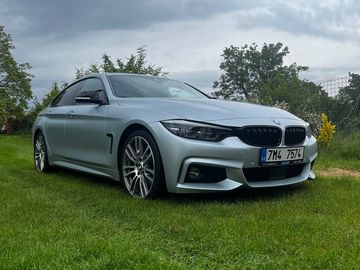 430i