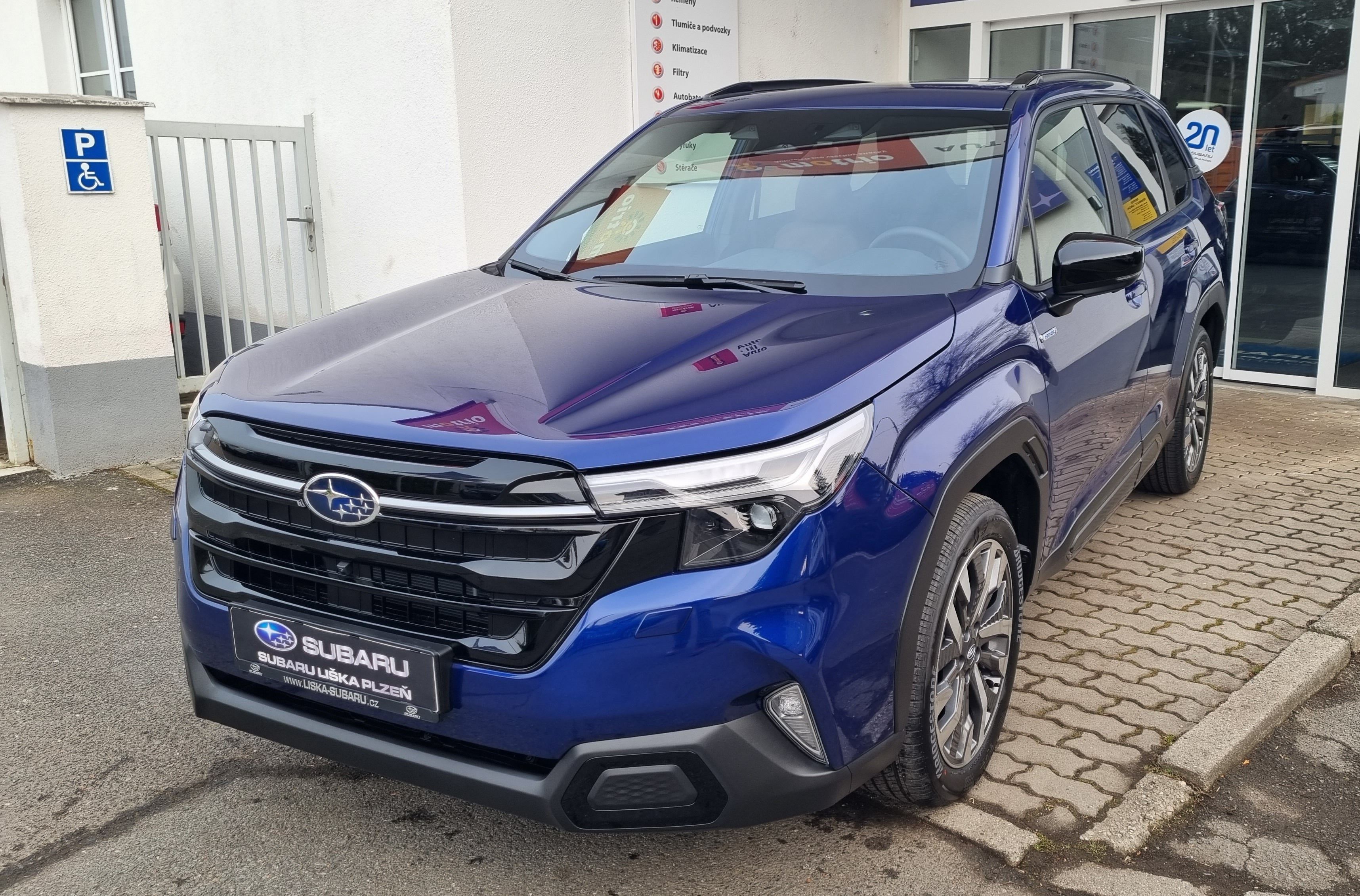 Subaru Forester, 2,0i CVT Touring + zimní kola