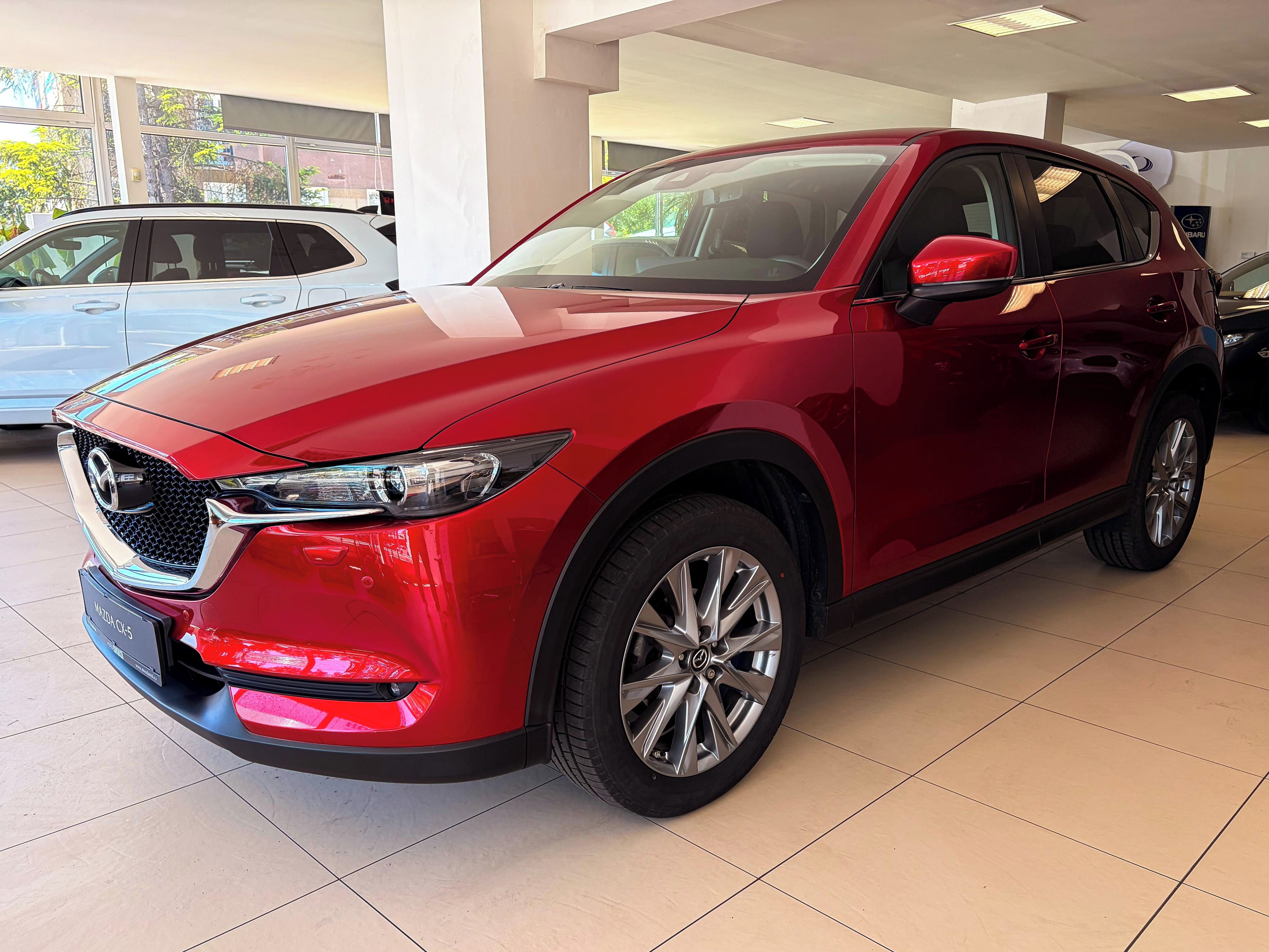 Mazda CX-5, 2,0 AT 2WD Atraction 1. maj. - fotka 4