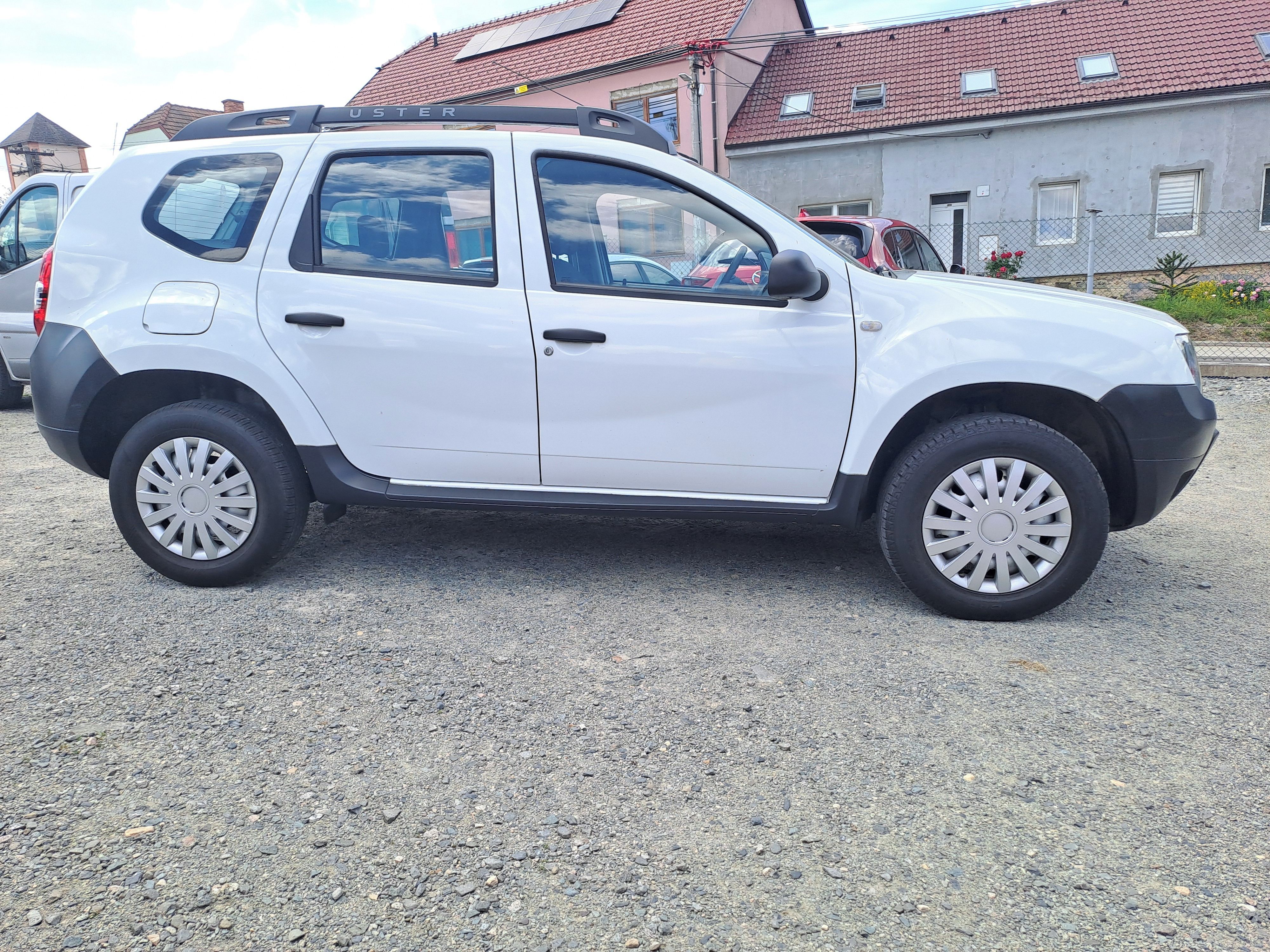 Dacia Duster, 1,6SCE 84KW,1.MAJ,S.KNIHA - fotka 5