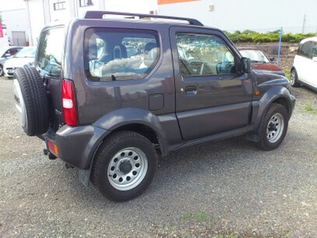 Suzuki Jimny, 1.3 4x4 klima 101000 km - fotka 3