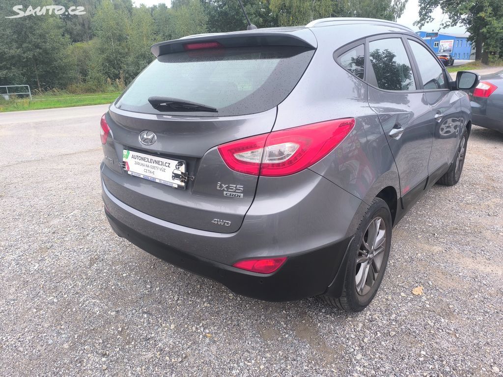 Hyundai ix35, 2.0D4X4,70KM,MAX VÝBAVA,KRÁSNÝ - fotka 3