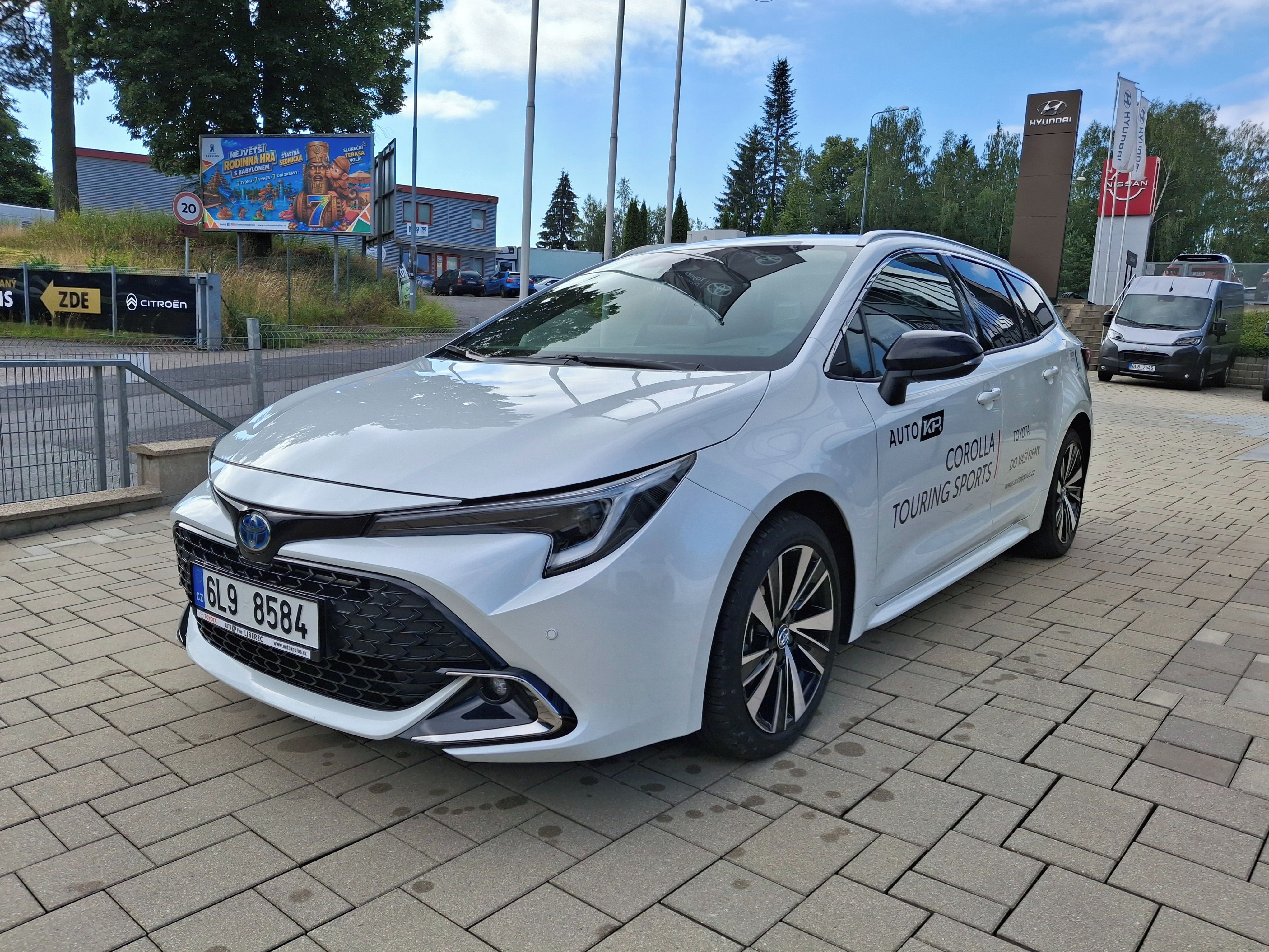 Toyota Corolla, TS 1.8 HEV STYLE - fotka 2