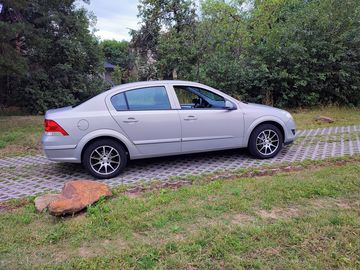 Opel Astra + Servisní knížka