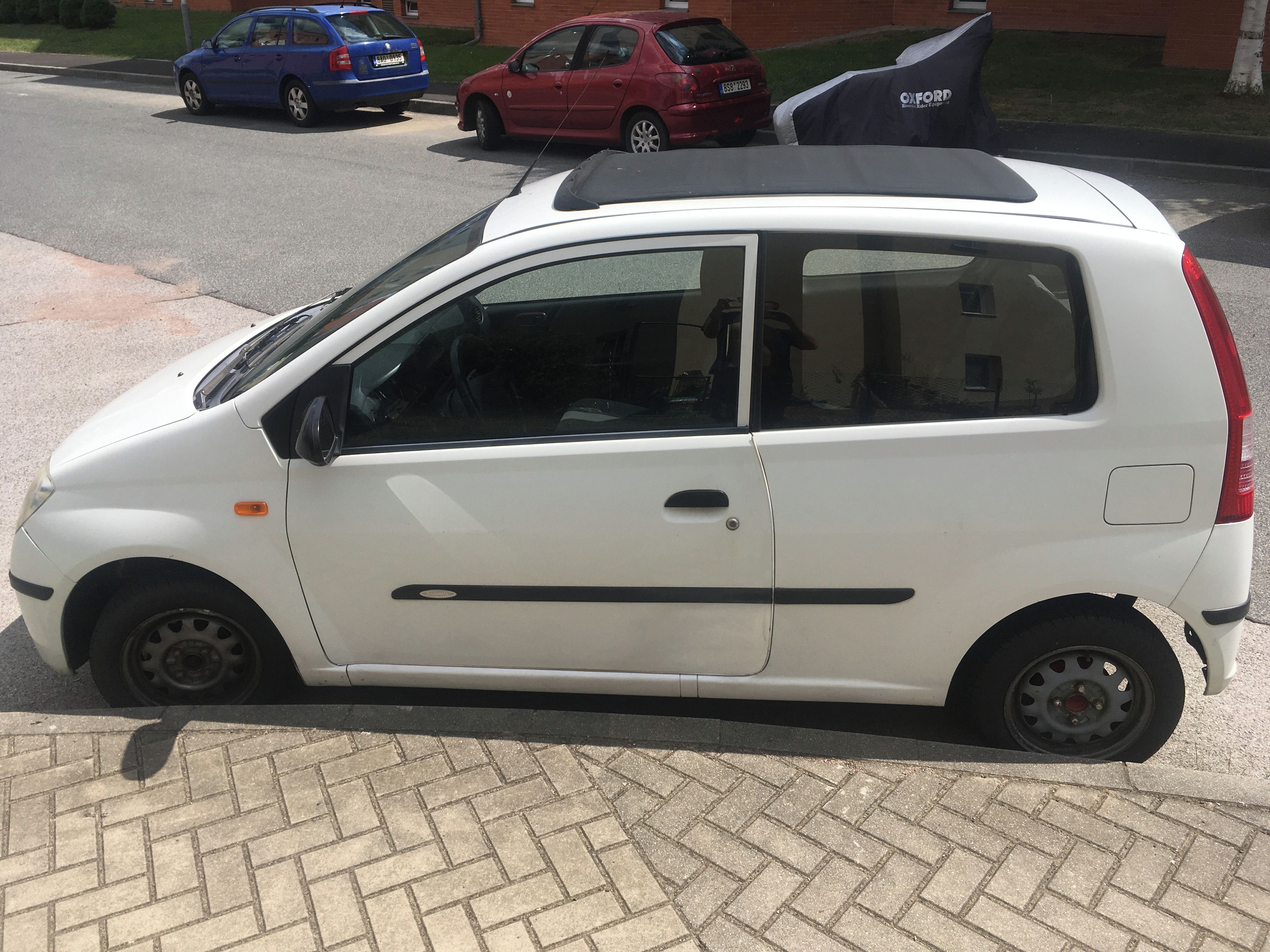 Daihatsu Cuore, 1.0 benzin, spotřeba 4 litry - fotka 2