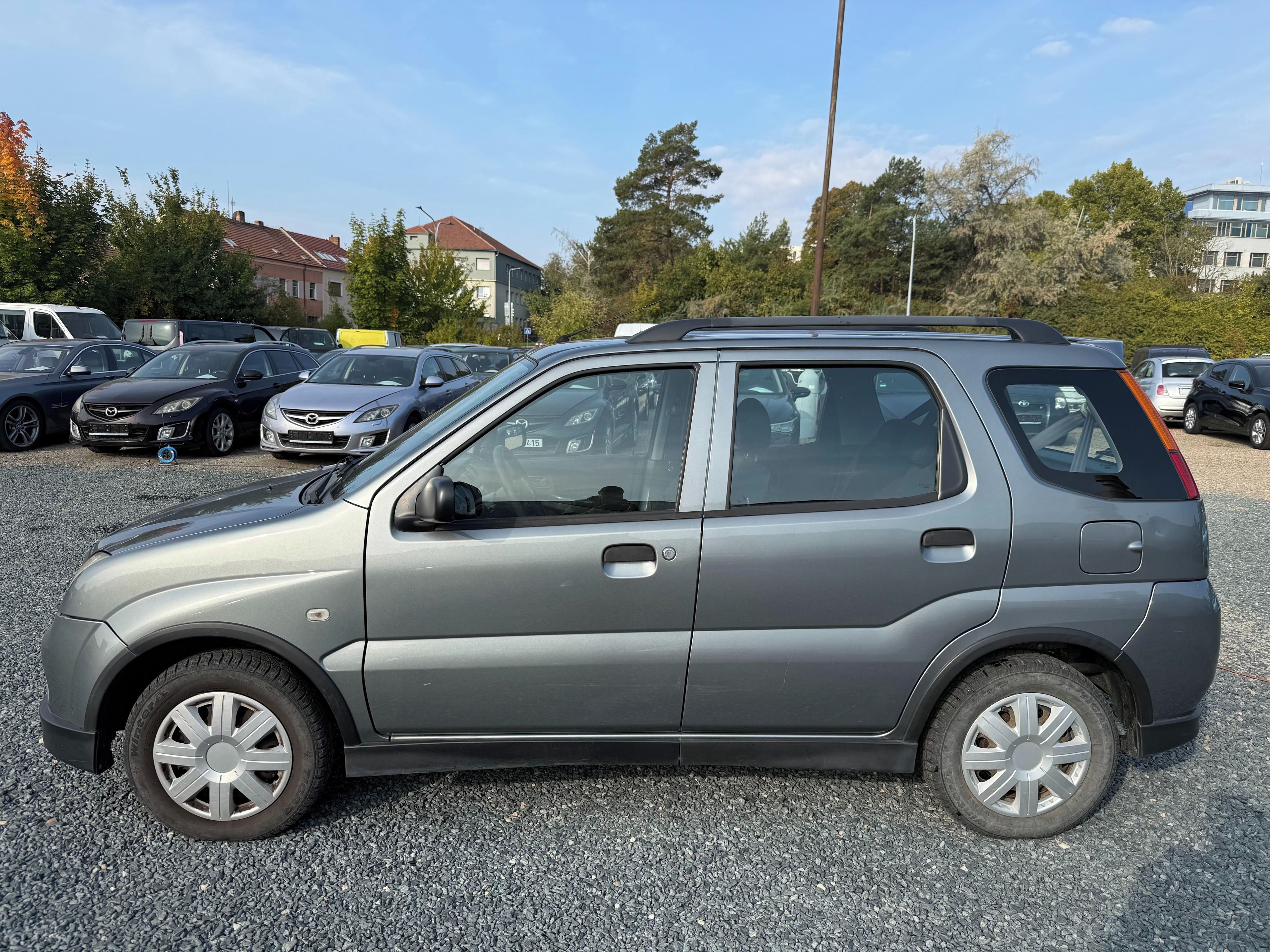 Suzuki Ignis, 1.3 i 69Kw 4x4 - fotka 6