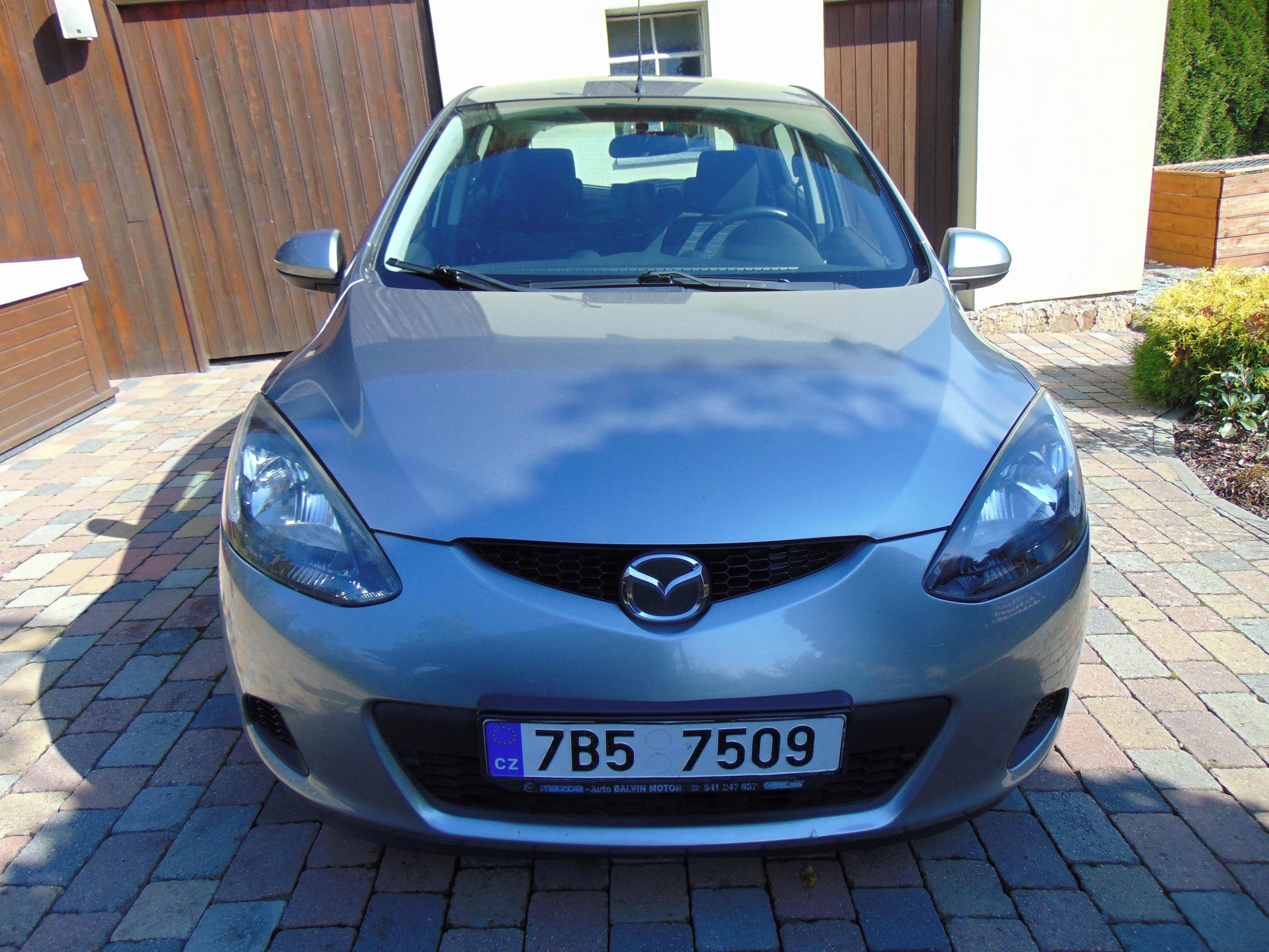 Mazda 2, najeto jen 74tis km po servisu - fotka 6
