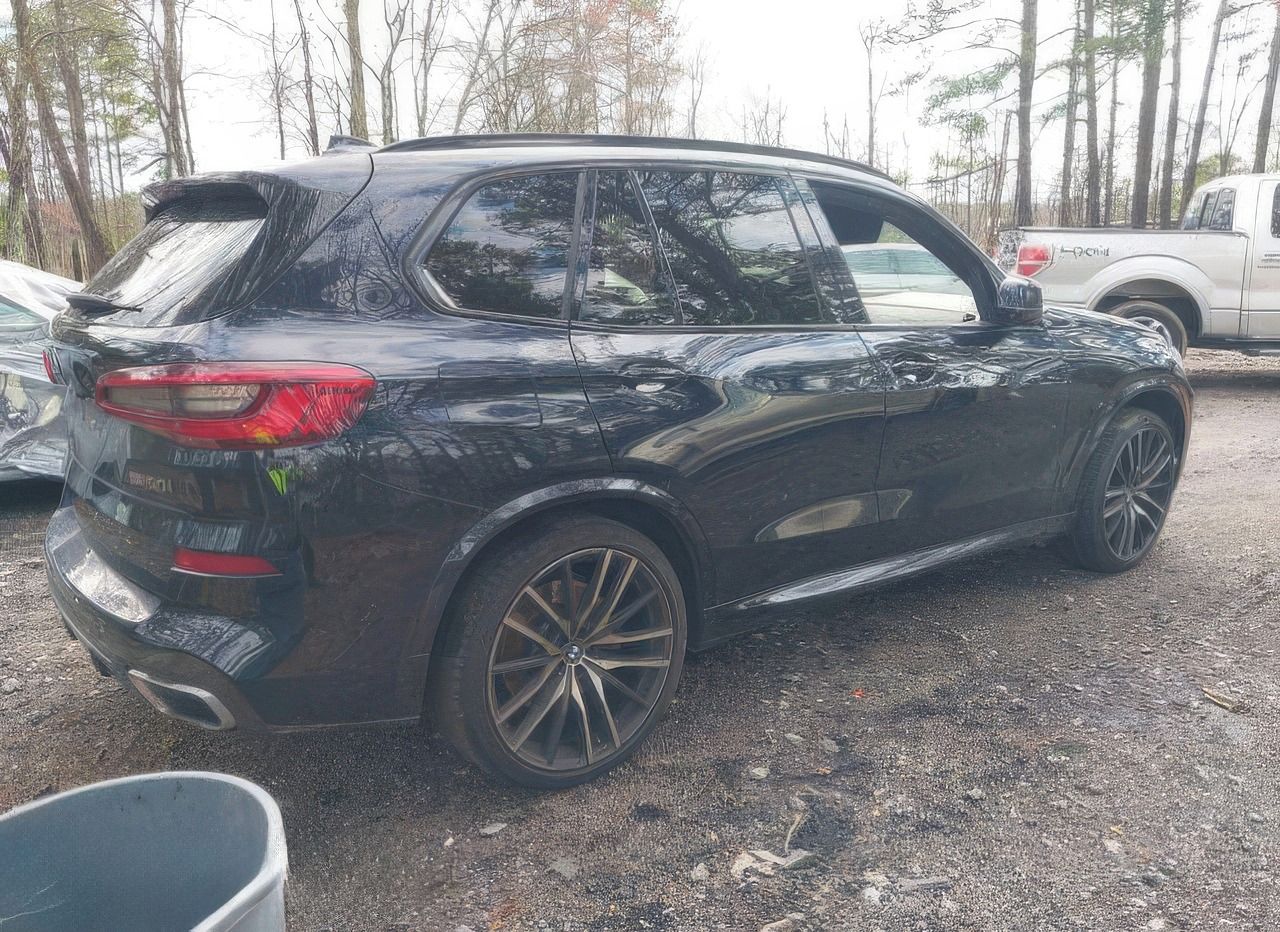 BMW X5, Auto na cestě - fotka 4