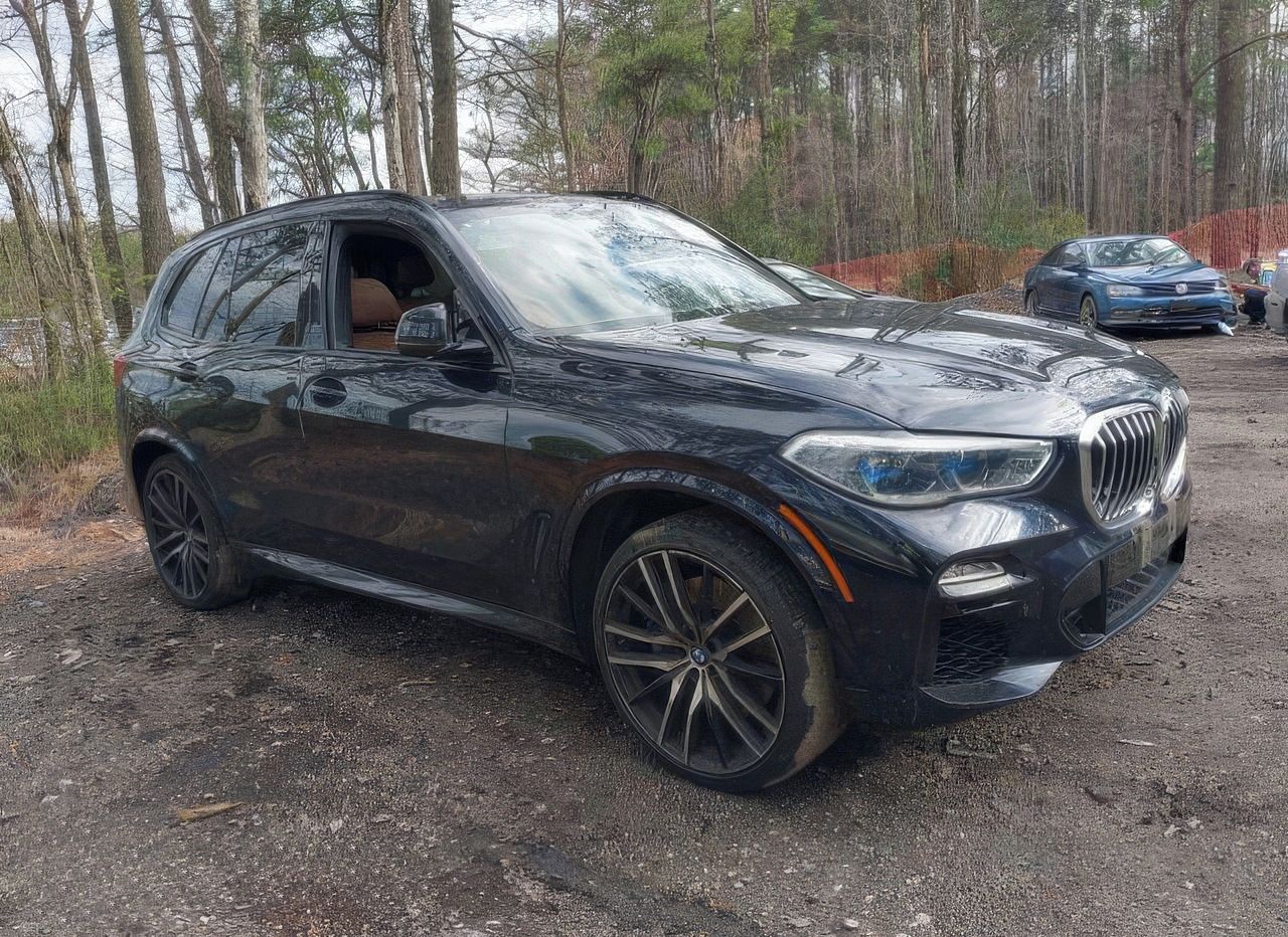 BMW X5, Auto na cestě - fotka 2